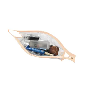 Top view of a transparent PVC makeup bag showing various cosmetic items inside.