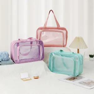Detailed view of large capacity transparent toiletry bags in three pastel colors