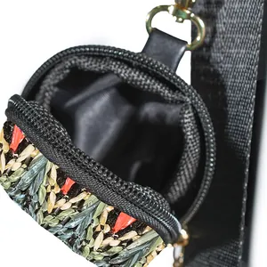 Close-up of the woven pouch detail showing smooth black zipper and interior lining