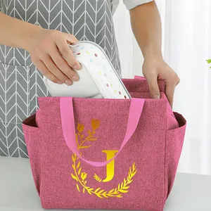Portable insulated pink lunch bag with yellow floral letter J design for students