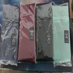 Detailed view of large capacity foldable travel storage bags in four vibrant colors