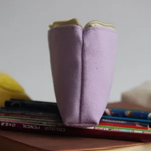 Close-up of Morandi purple canvas pencil pouch with sturdy zipper detail