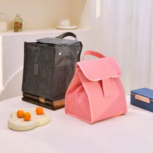 Two stylish grey and pink insulated Oxford cloth lunch bags with convenient carry handles