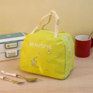 Vista dettagliata della borsa termica per il pranzo verde lime con simpatico cartone animato