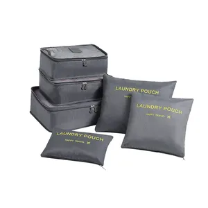 Grey 6-piece travel packing cubes and laundry pouch set for organized luggage storage