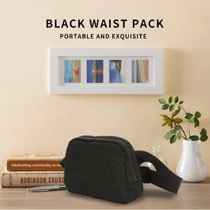 Elegant black glitter waist pack with sparkling fabric shown in a lifestyle desk setting