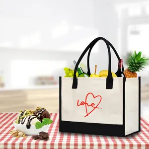 Macro shot of canvas tote bag with red heart print in a kitchen lifestyle setting