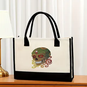 Bolso tote de lona grande con estampado colorido de calavera y asas negras