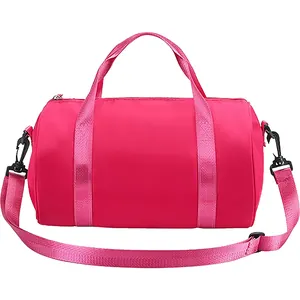 Stylish pink waterproof cylindrical sports duffel bag for gym, yoga, and ballet dance.