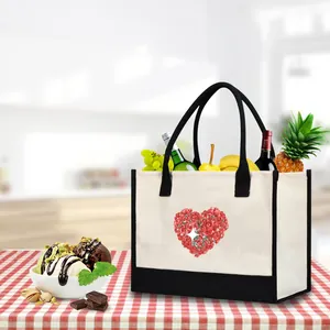 Large capacity canvas tote bag with floral heart print shown in a lifestyle kitchen setting