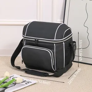 Close-up of black insulated picnic cooler bag showing 32x22x32cm dimensions