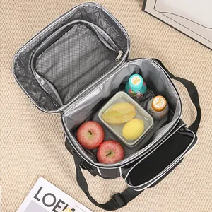 Top view of open insulated picnic bag showing large capacity with snacks and drinks