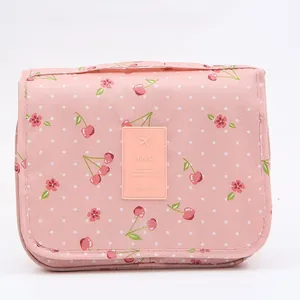 Portable pink floral print toiletry bag and travel cosmetic organizer with hook
