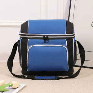 Front view of a blue and black insulated picnic cooler bag with shoulder strap.