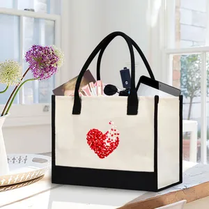Stylish large capacity canvas tote bag with red heart petal print in a lifestyle setting