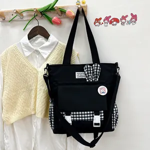 Bolso tote de lona negra con estampado de cuadros y orejas de conejo para colegio