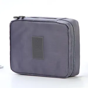 Bolsa de aseo de viaje gris de gran capacidad con asa y doble cremallera resistente