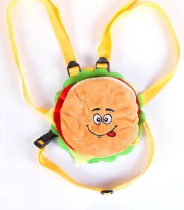 Close-up detail of the plush hamburger pet backpack featuring adjustable yellow straps