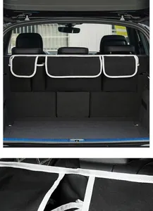 Detailansicht der robusten Nähte und weißen Paspeln am schwarzen Auto-Kofferraum-Organizer.