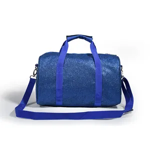 Detailed front view showing texture of a blue glitter duffel bag for yoga, dance and travel
