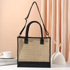 Borsa tote in juta minimalista urbana con bordo nero e tracolla regolabile rimovibile