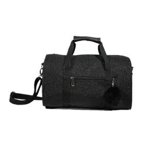 Black glitter gym duffel bag for dance and yoga with plush pom-pom and shoulder strap.