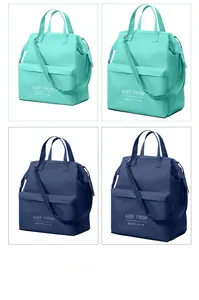 Large capacity insulated lunch bags in mint green and navy blue with shoulder straps