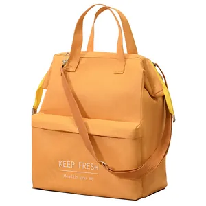 Large orange insulated lunch bag with adjustable shoulder strap and waterproof lining