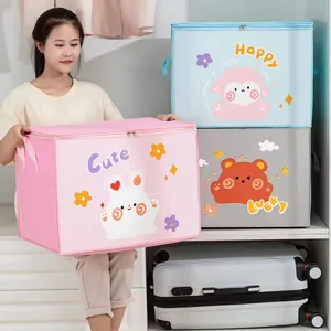 Large cartoon non-woven storage bags for clothes and quilts shown in a home setting