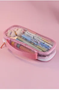 Transparent pink large capacity pencil case filled with colorful pens