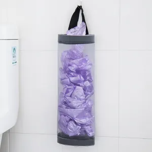 Wandmontierte graue Netztasche zur Organisation von Küchenmülltüten