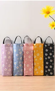 Detailansicht der Wand-Müllbeutel-Aufbewahrungstaschen mit Gänseblümchenmuster in fünf Farben