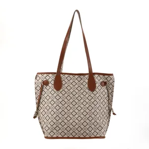 Stylish large capacity tote bag for women with geometric floral print and brown straps