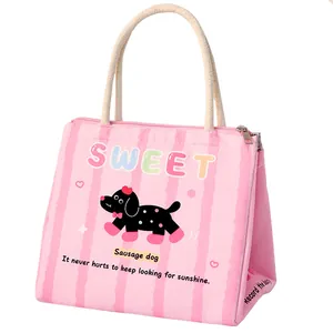 Cute pink striped insulated lunch bag with cartoon sausage dog design and rope handles