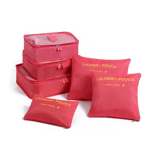 6-piece vibrant pink travel organizer set featuring mesh packing cubes and laundry pouches