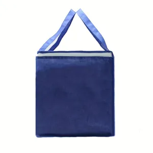 Front view detail of a large blue waterproof storage bag for bedding and moving