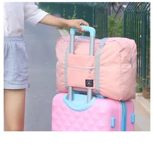 Large capacity waterproof folding travel bag with back sleeve for suitcase handles