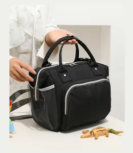 Close-up of a black large capacity mommy cooler bag featuring insulated lining and side mesh