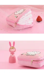 Close-up of cute pink cartoon sanitary napkin pouch showing its internal storage capacity