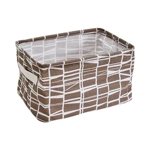 Foldable fabric storage basket with brown geometric grid pattern for home organization.