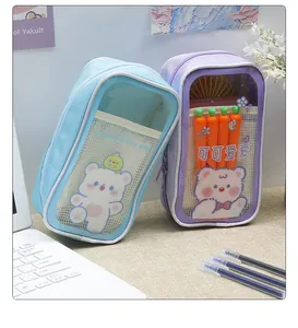 Detail view of cute transparent pencil cases featuring bear illustrations and mesh pockets.