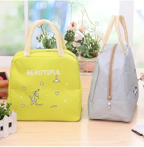 Détails du sac à déjeuner isotherme montrant les vues de face et de côté avec fermeture.