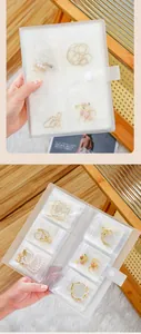 Álbum de almacenamiento de joyas portátil antioxidación con bolsillos transparentes