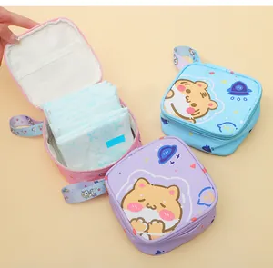 Detail view of cute cartoon sanitary napkin storage bags in pink, blue and purple colors
