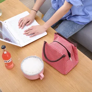 Bolsa de almuerzo aislada a rayas rojas y blancas portátil para la oficina y la escuela