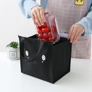 Black insulated lunch bag with cute cat face design and thick aluminum foil lining
