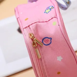 Cute pink portable storage bag for sanitary napkins featuring smooth dual metal zippers