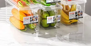 Large clear refrigerator storage bins with handles for organizing fresh fruits and vegetables