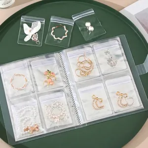 Álbum de almacenamiento de joyas transparente con bolsas de PVC antioxidantes para aretes