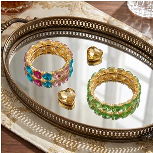 Colorful heart-shaped crystal elastic bracelets in gold alloy with vibrant jewel tones